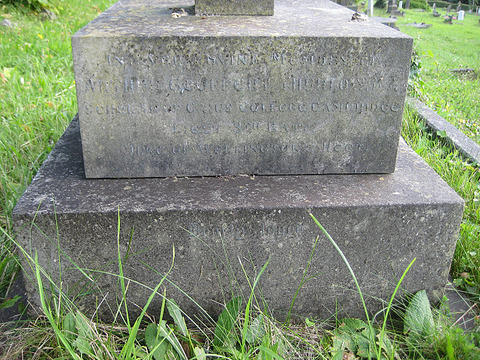 Memorial to A G Thurlow at base of cross